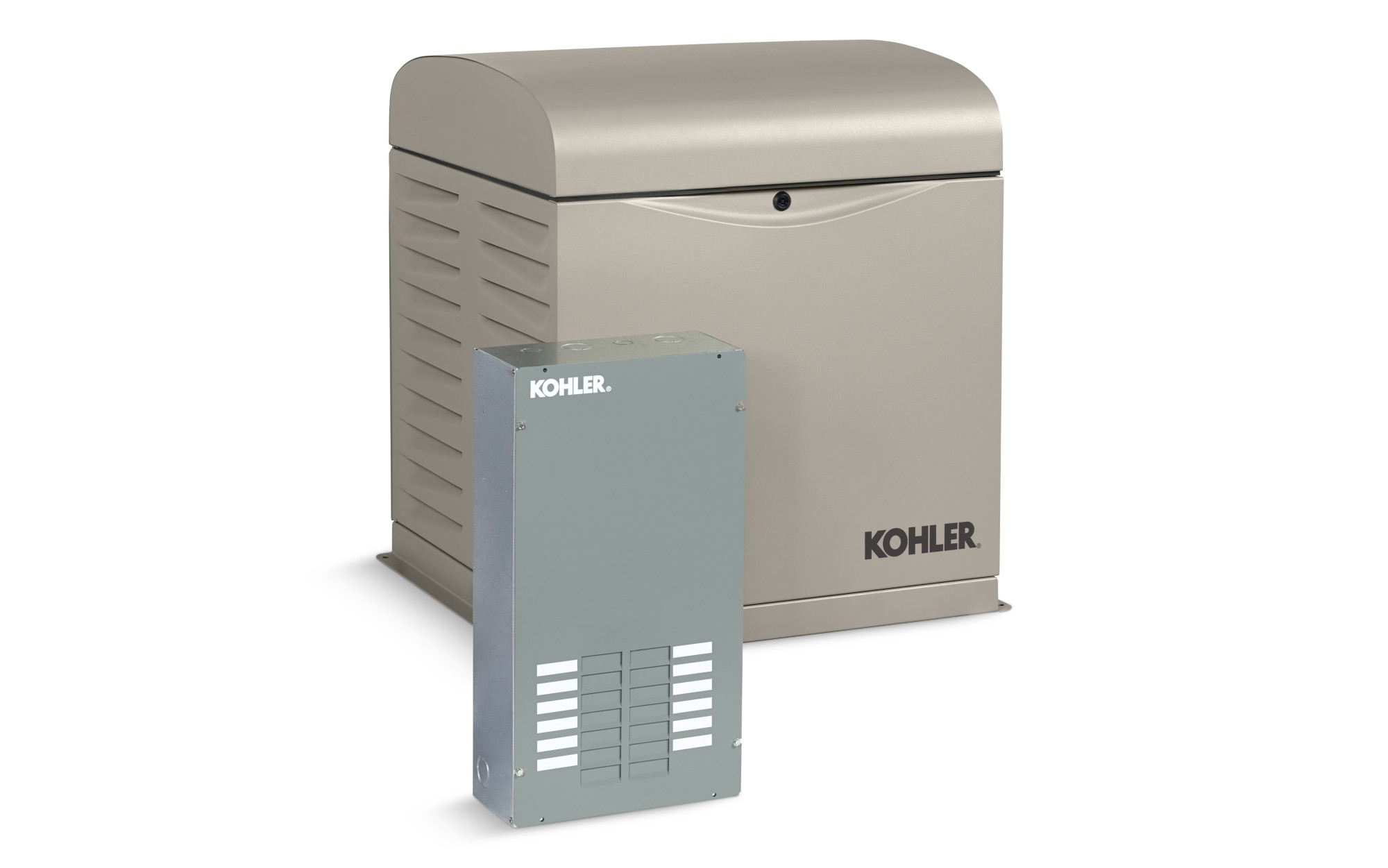 Angled left side view of a Kohler home generator in taupe color with a transfer switch in front on empty background