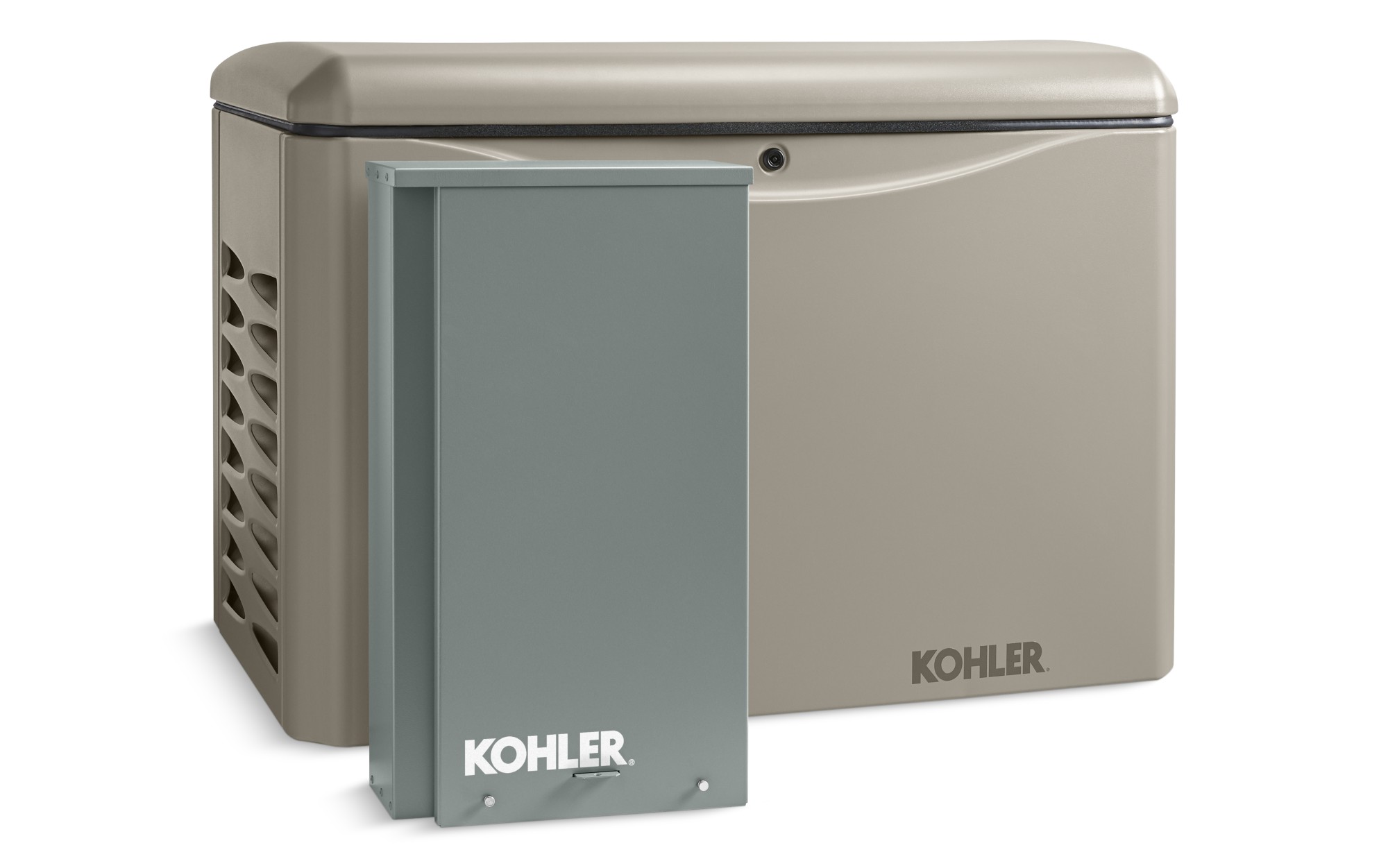 Angled left side view of a Kohler home generator in taupe color with a transfer switch in front on empty background
